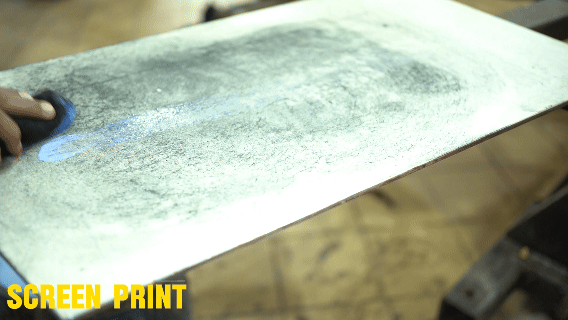 an abstract photo of a curved building with a blue sky in the background