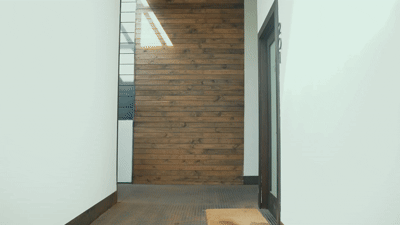 black and brown leather padded tub sofa