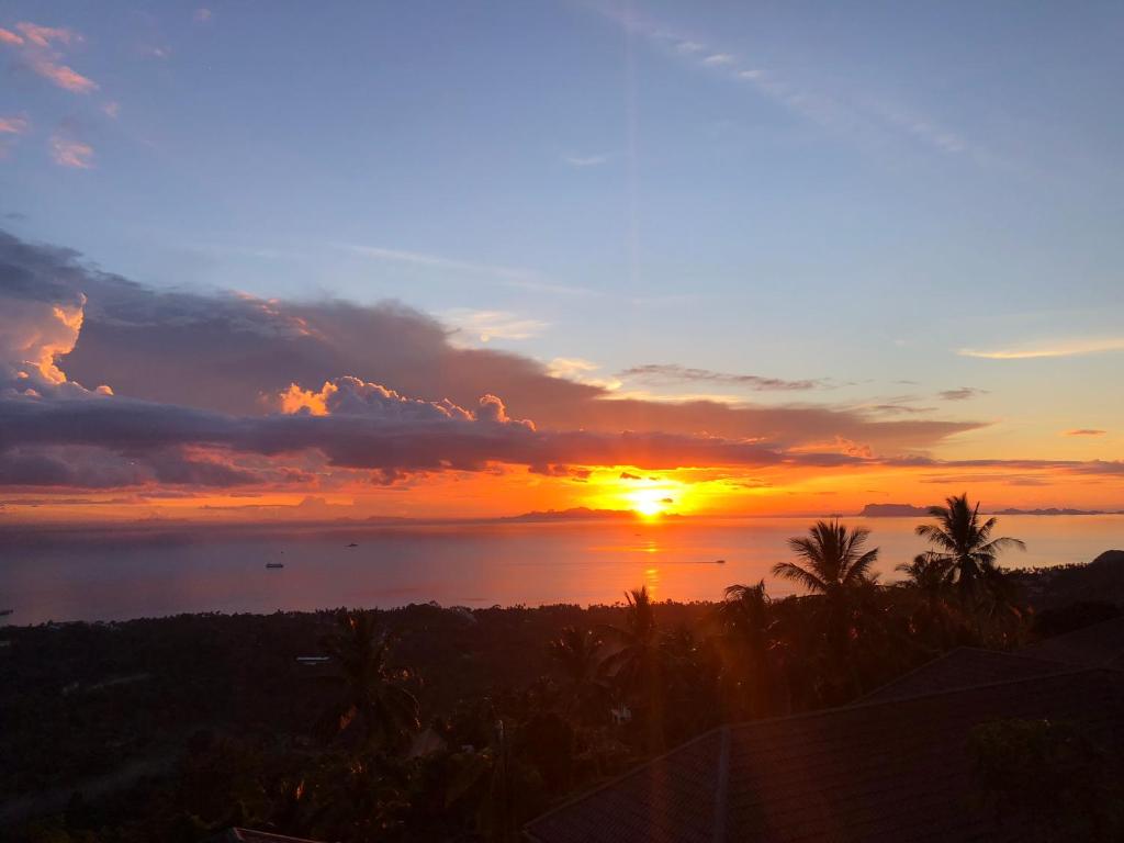 Sunset view from Paradise Village Samui hillside over the Five Islands