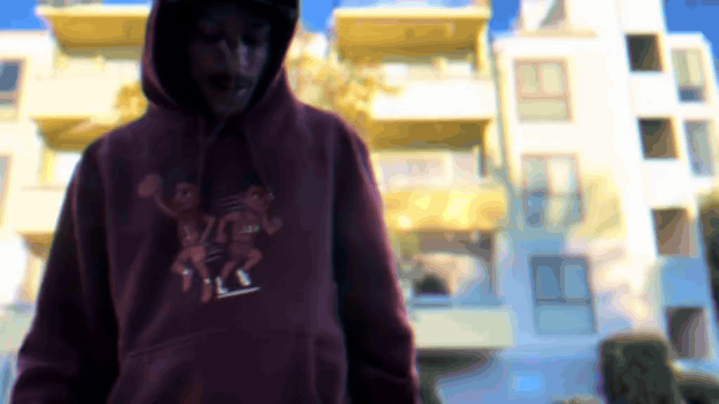 an abstract photo of a curved building with a blue sky in the background