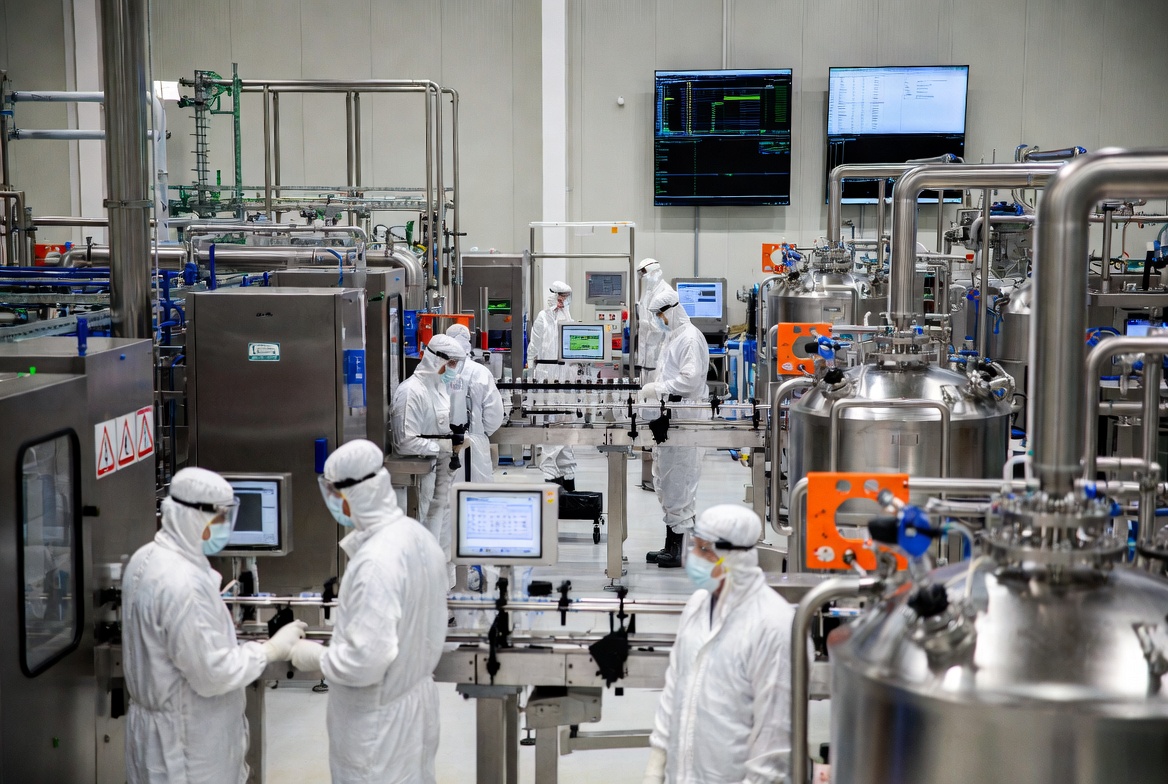 Low VOC water-based chemical manufacturing process in a sustainable industrial facility