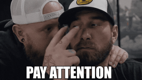 GIF guy telling another guy to pay attention