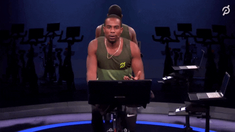 GIF black guy on a bike saying Game time