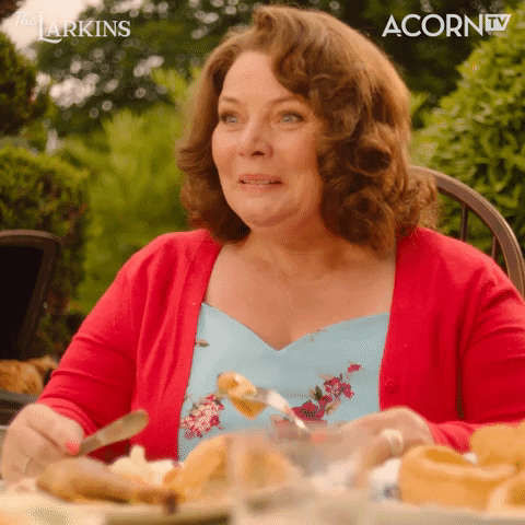 Older women happy eating food saying okay
