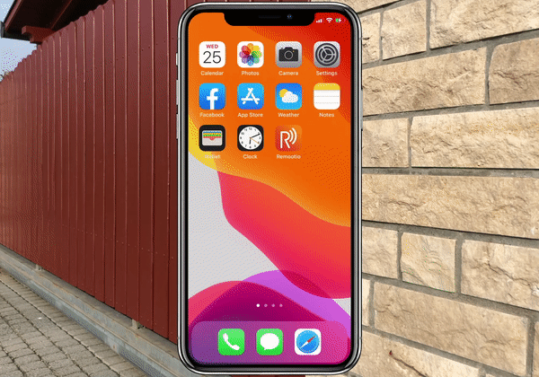 a phone with a picture of a phone in front of a brick wall