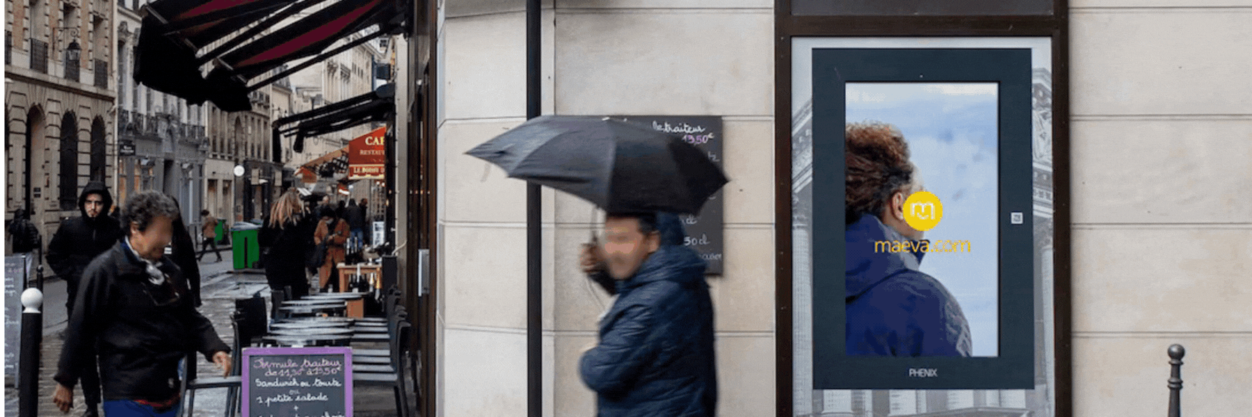 a couple of women sitting on top of a couch