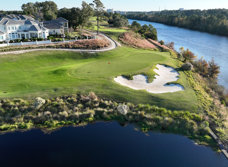 Grande Dunes Resort elevated fairway with water and bridge