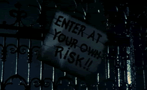 a sign that says enter at your own risk