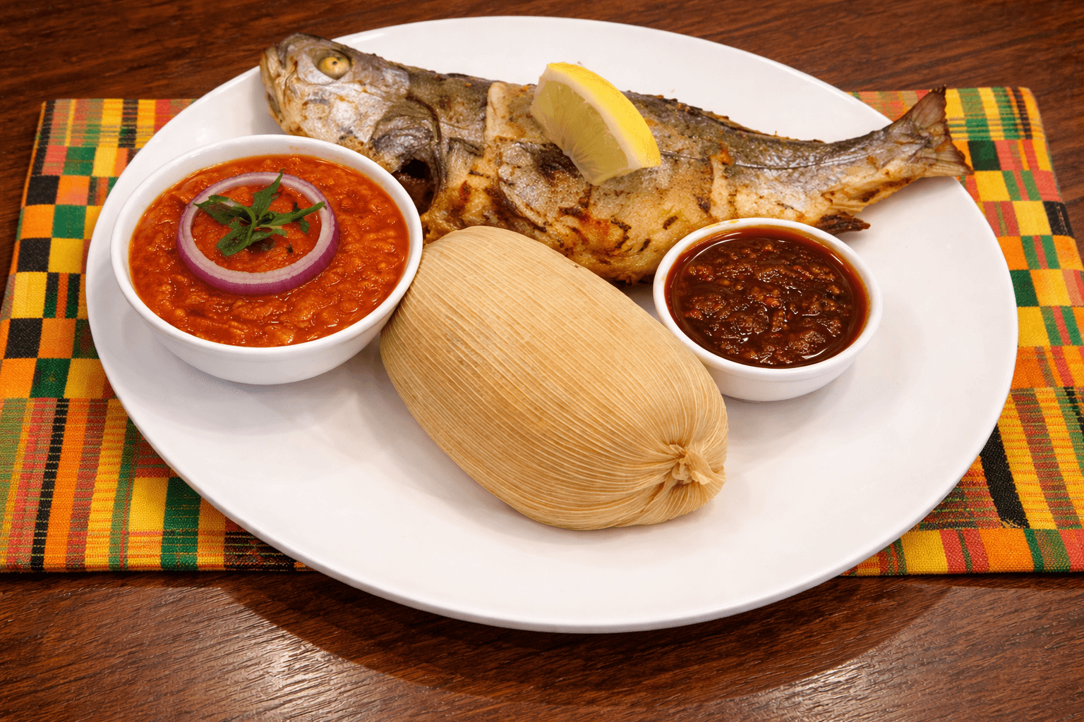 Kenkey with fried fish and pepper