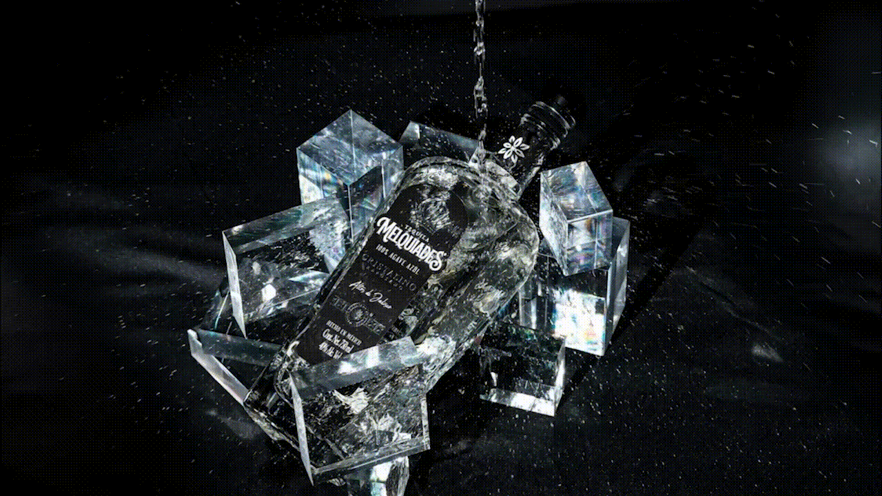 a glass of water sitting on top of a wooden table