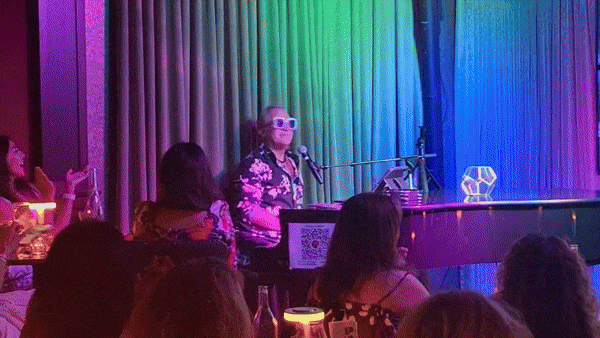 black and brown leather padded tub sofa