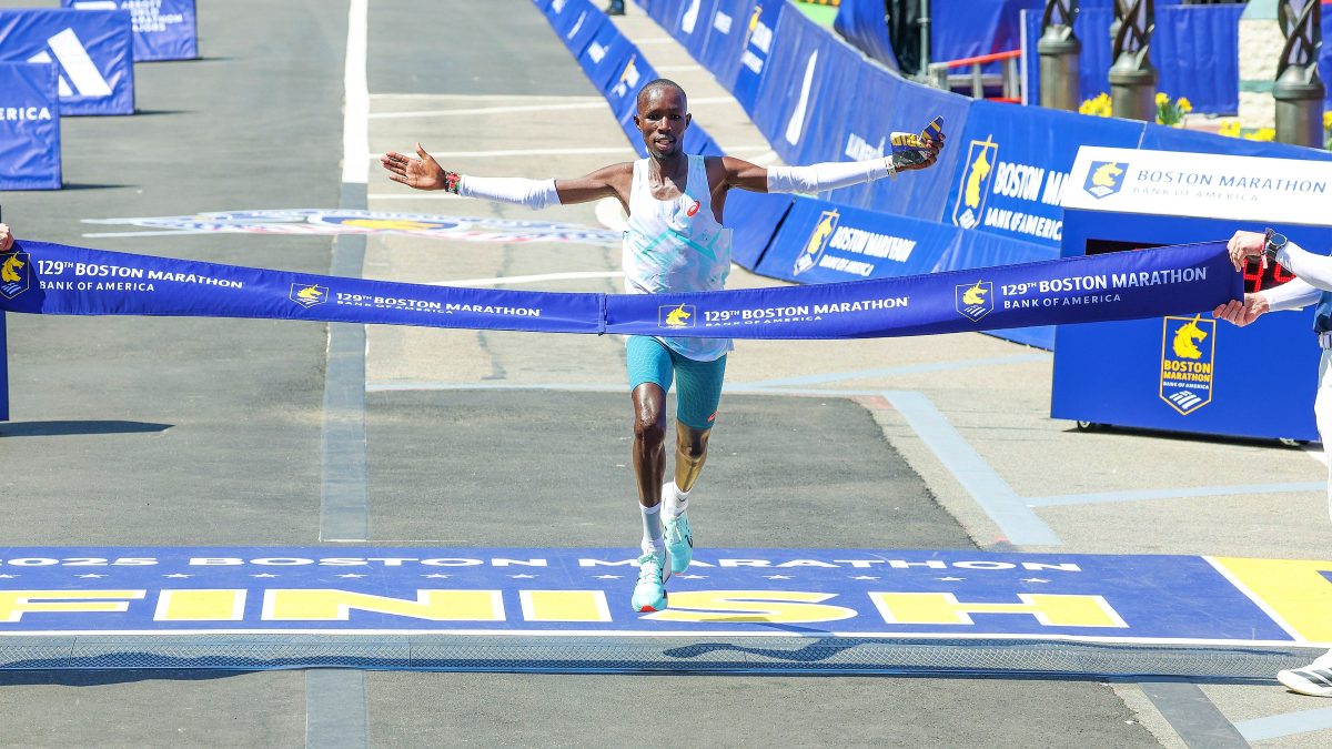 John Korir celebrating his course record victory at the 2025 Boston Marathon.