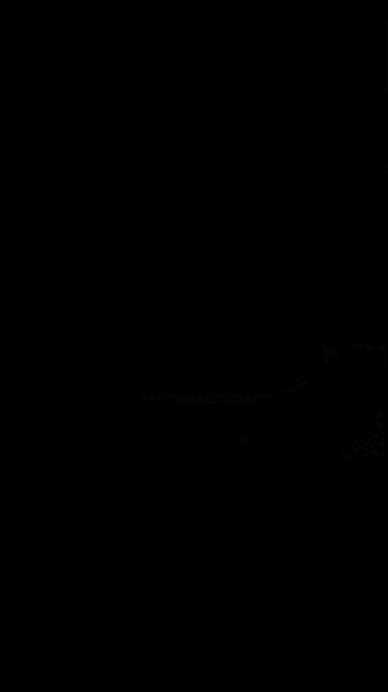 an abstract photo of a curved building with a blue sky in the background