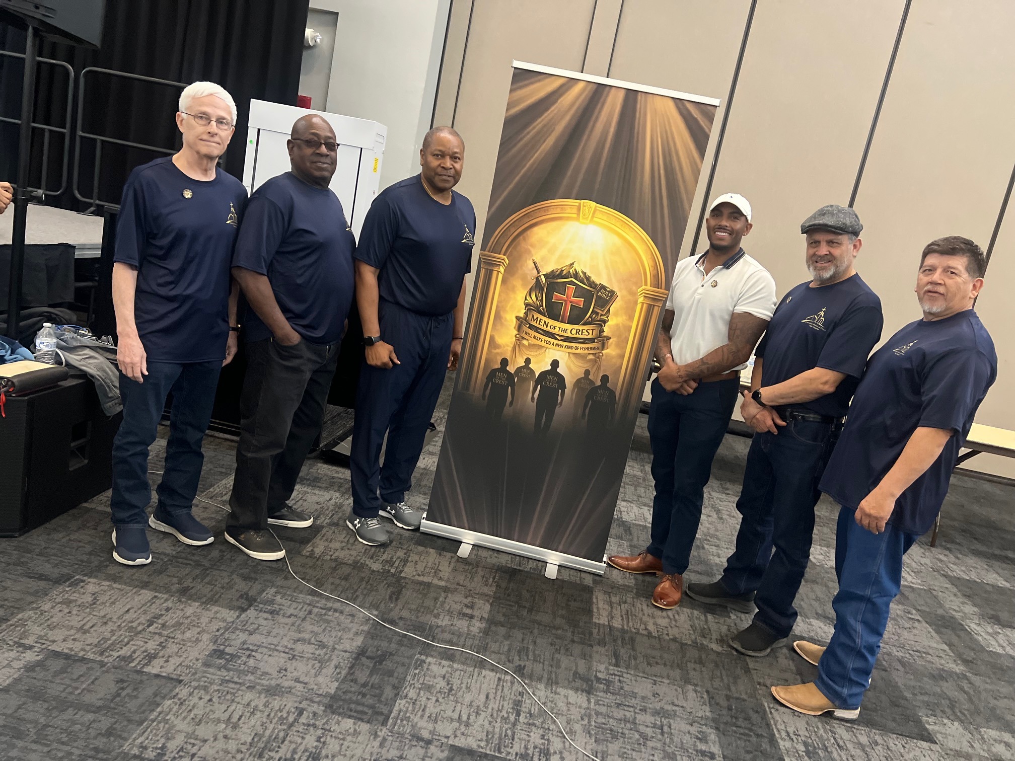 Group photo in front of banner