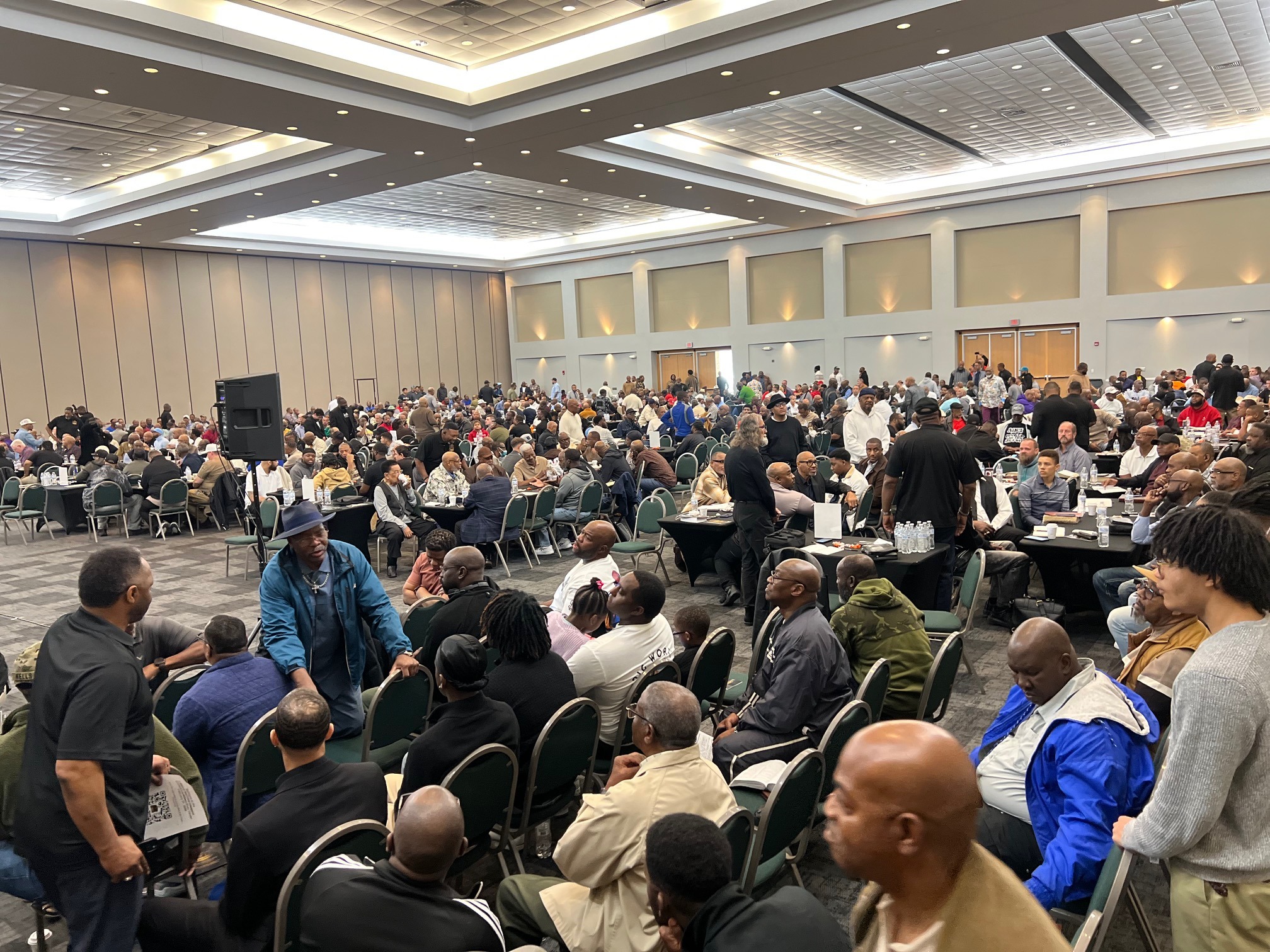 Very crowded ballroom filled with participants