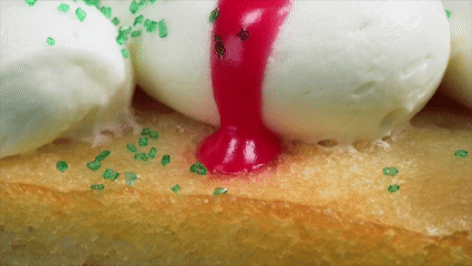 an abstract photo of a curved building with a blue sky in the background