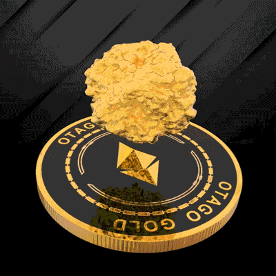 a gold coin with a gold nugget on top of it