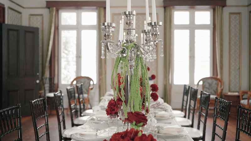 a table set for a formal dinner with place settings