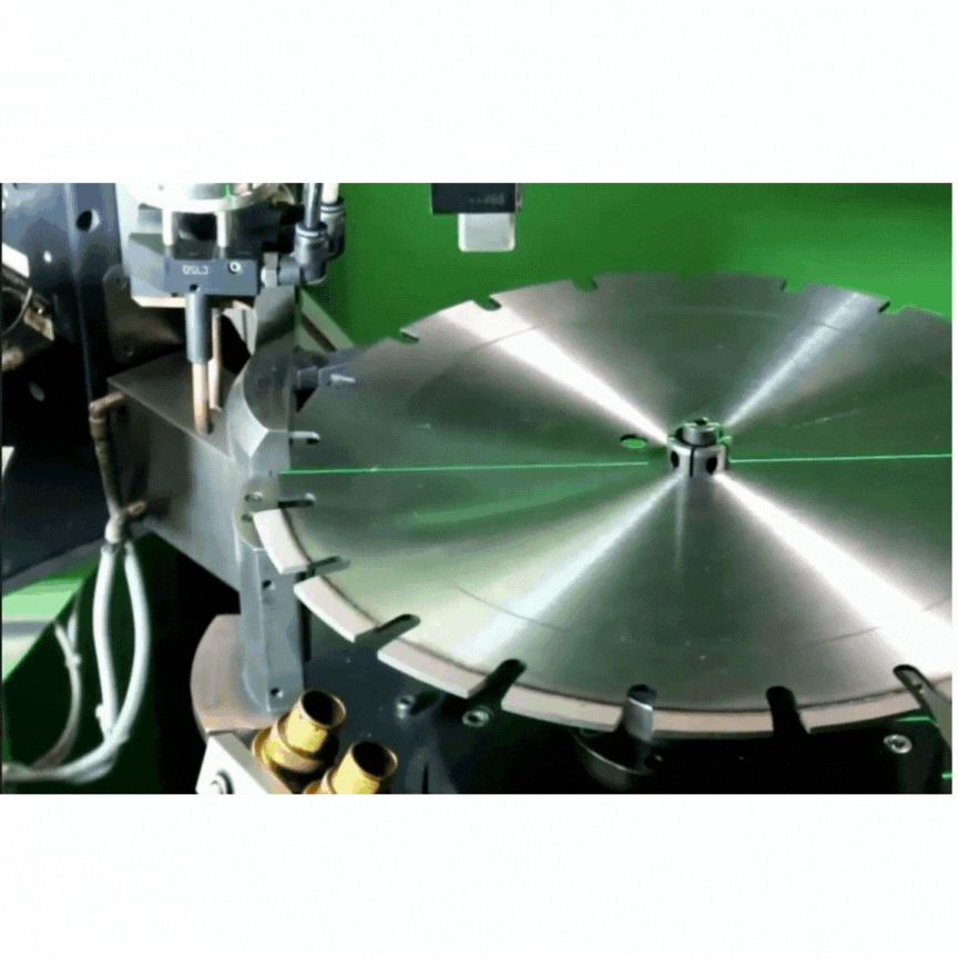 a piece of metal being cut with a machine