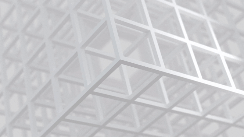 an abstract photo of a curved building with a blue sky in the background