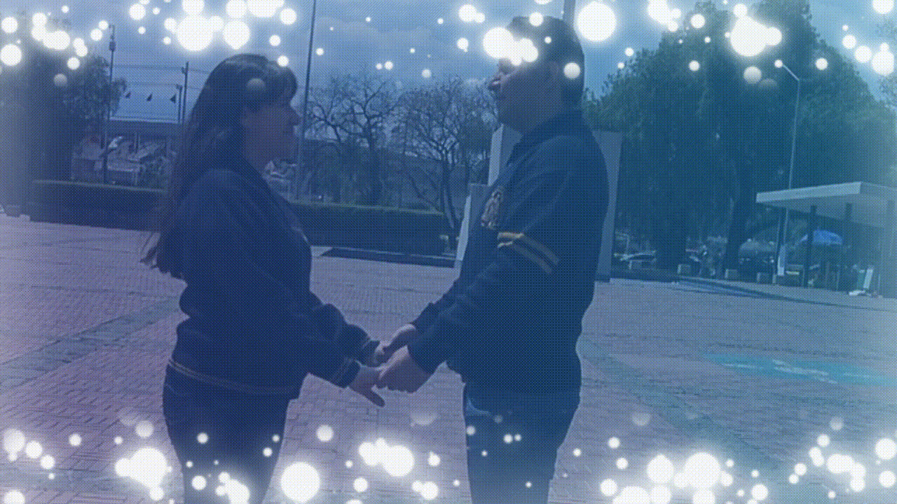 couple wearing silver-colored rings