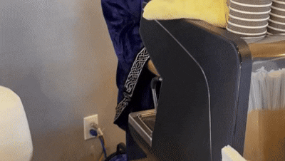 woman wearing yellow long-sleeved dress under white clouds and blue sky during daytime