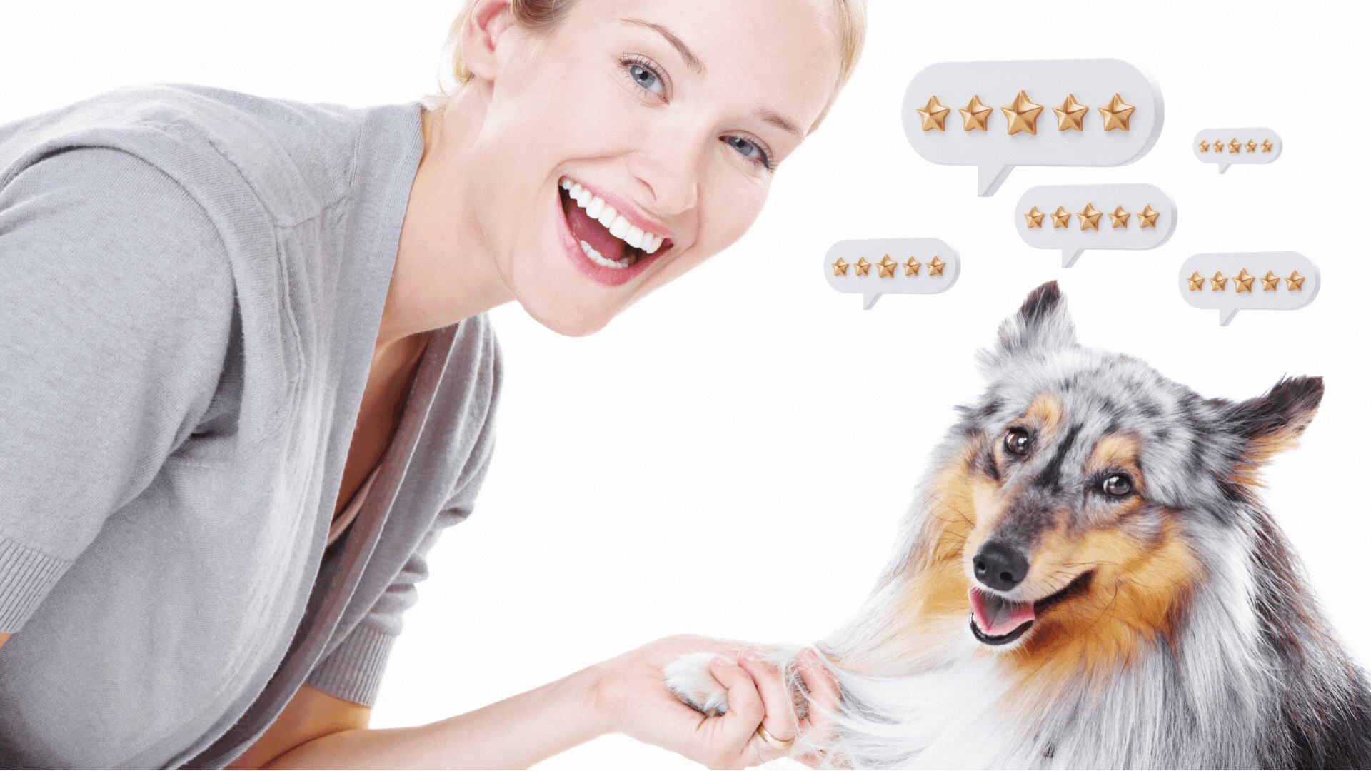 A woman shaking a dogs paw.
