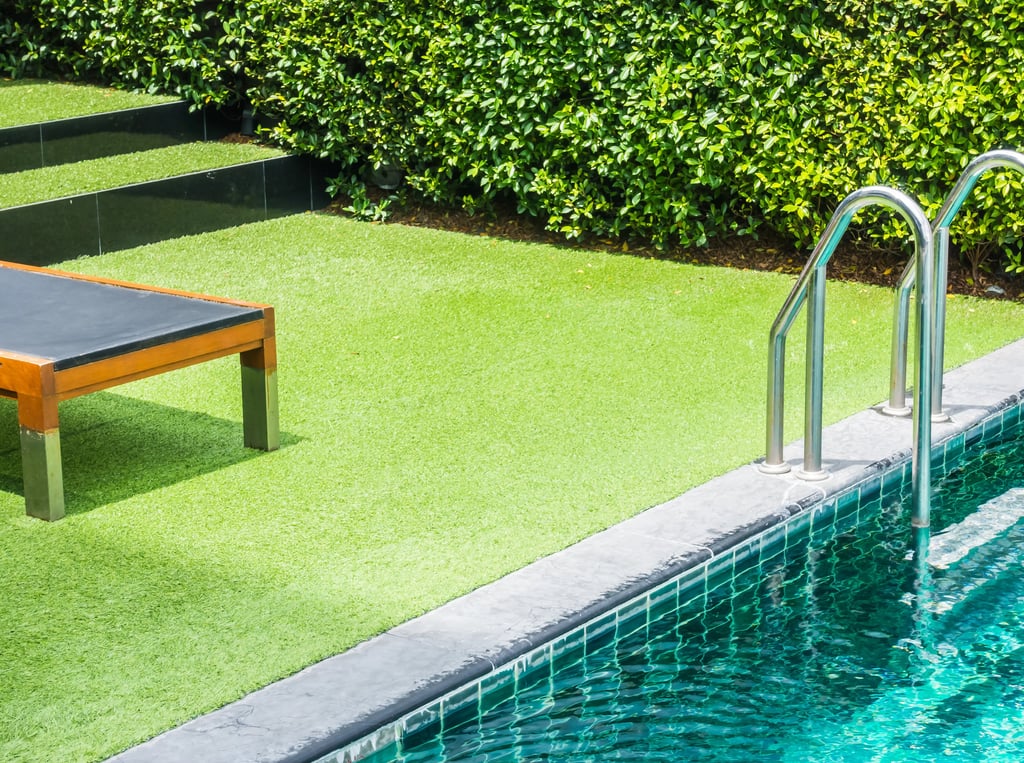 https://assets.zyrosite.com/cdn-cgi/image/format%3Dauto%2Cw%3D1024%2Ch%3D763%2Cfit%3Dcrop/YyvyrZ6r1Piz9Orm/outdoor-swimming-pool-with-artificial-turf-m7VDXWOLeJuVDMEn.webp