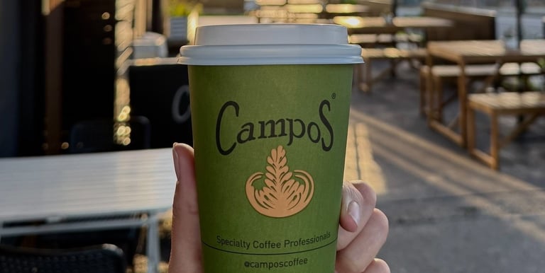 Campos coffee cup outside the café