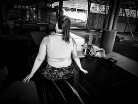 Woman practising a seated yoga pose