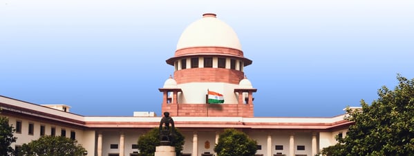 Supreme Court of India building New Delhi with Indian flag and dome structure