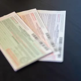 Blank bail bonds sitting on a table.