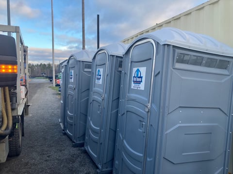 A row of portable toilets 