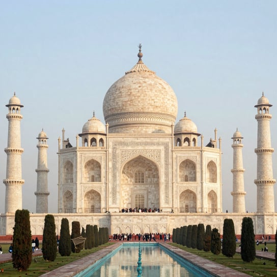 a bridge over a body of water with a building in the background
