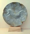 A clickable link leading to a page with further information about the sculpture 'Of Awe and Aura'. 