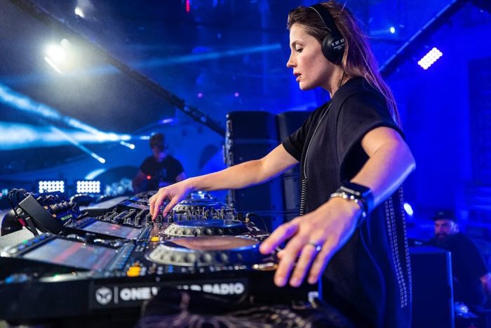 The DJ Charlotte de Witte playing music at a concert