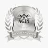 a silver plated badge with a silver ribbon around it
