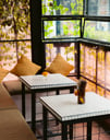 a table with two tables and a window