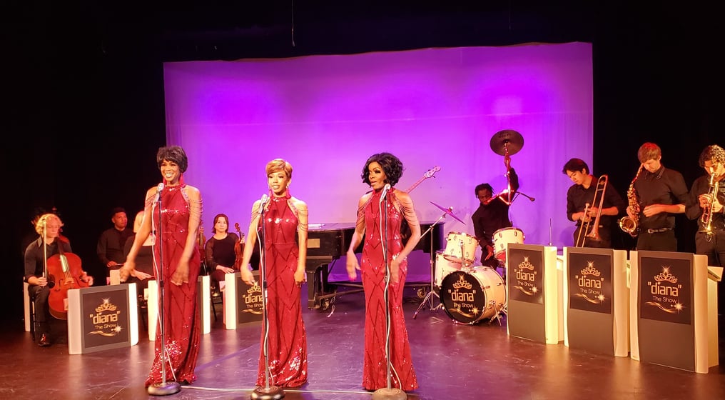a group of people standing on a stage