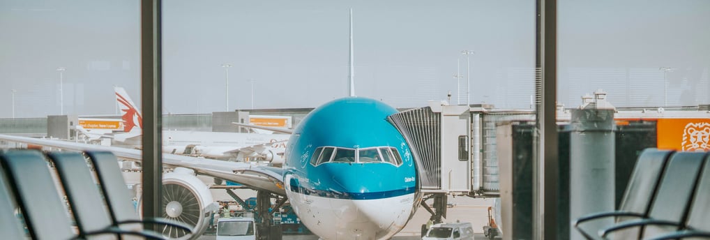 a plane is parked at the airport