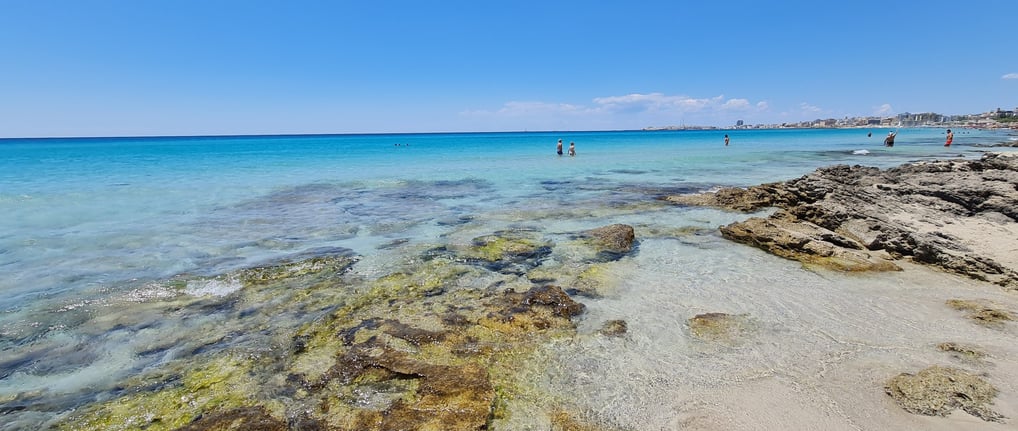 Baia Verde Beach, Puglia – A lively stretch of golden sand and shallow, transparent waters near Gall
