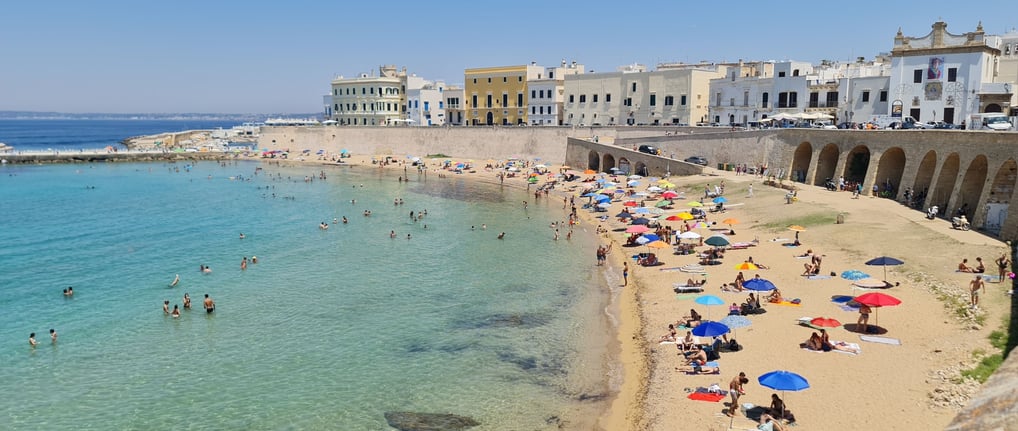Gallipoli Beach, Puglia – A stunning coastline with golden sands and shallow, crystal-clear waters, 