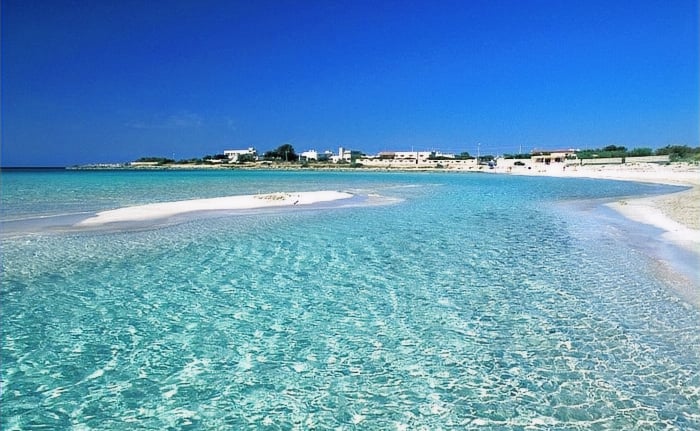 Punta Prosciutto Beach, Puglia – Pristine white sand dunes and crystal-clear turquoise waters, an un