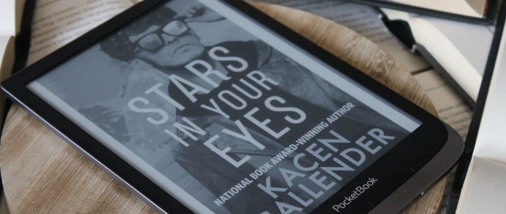 a book is sitting on a chair with a book and a book