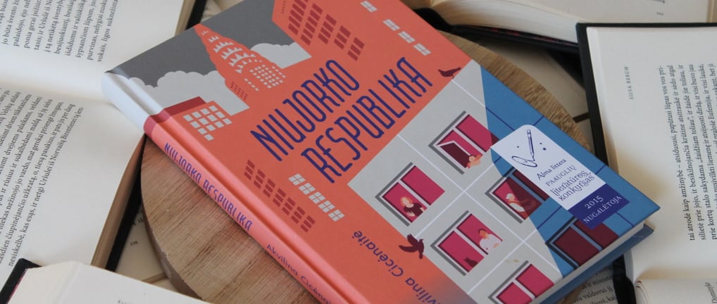 a book with a bookmark on it and a cup of coffee