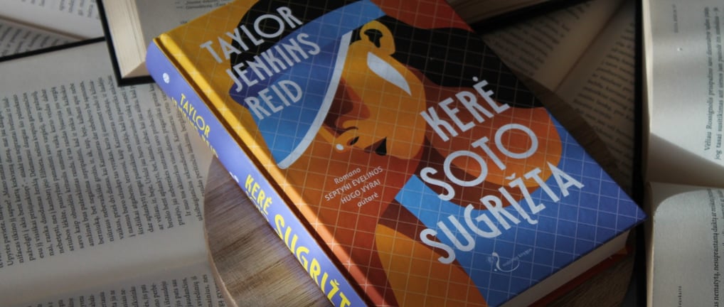 a book with a book on top of a table tennis carrie soto is back