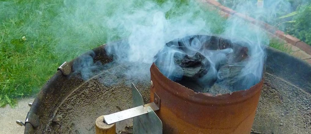 smoke coming out of charcoal chimney