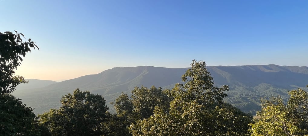 a mountain view of a mountain range in the distance