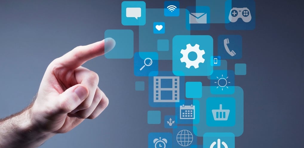 a person pointing at a screen with a finger on it-digital vs. traditional marketing
