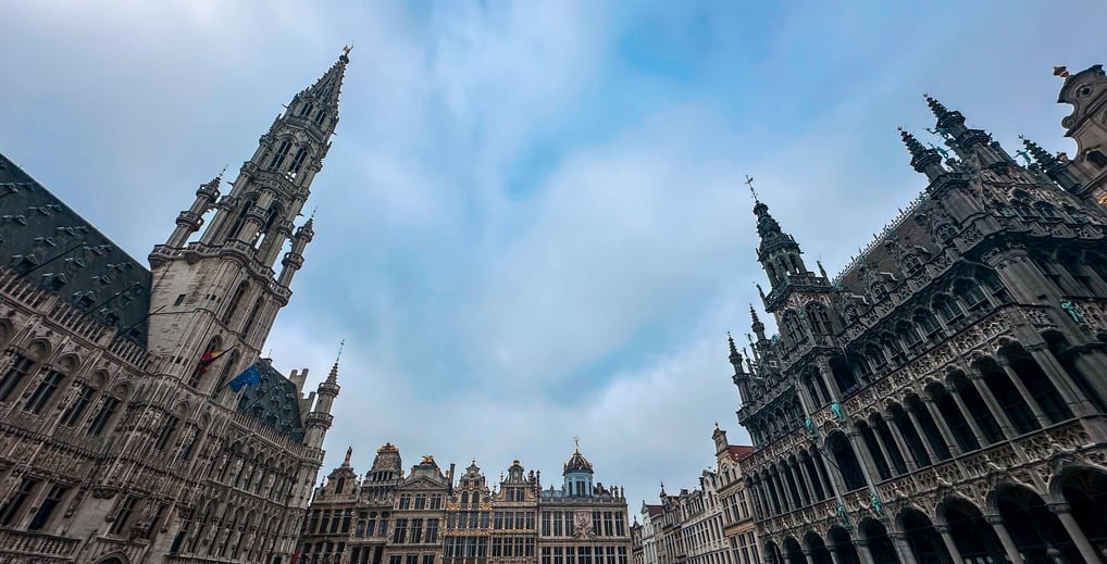 a large building with a clock tower in the middle of it